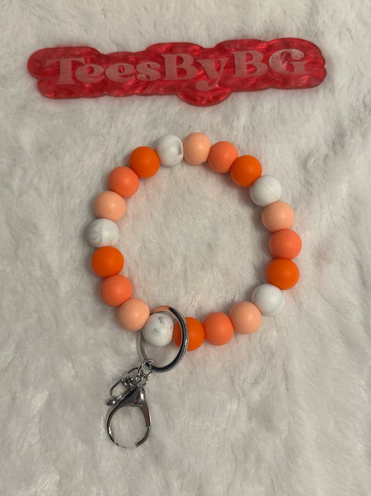 Orange and Marble Wristlet with silver hardware